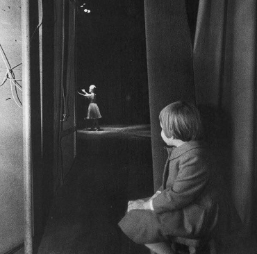 A very young Carrie Fisher watches her mom, Debbie Reynolds, on stage at the Riviera Hotel in Las Vegas, 1963 (photographer unknown).
